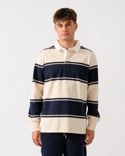 model wearing a GANT Mens Striped Rugger in 433 Evening Blue