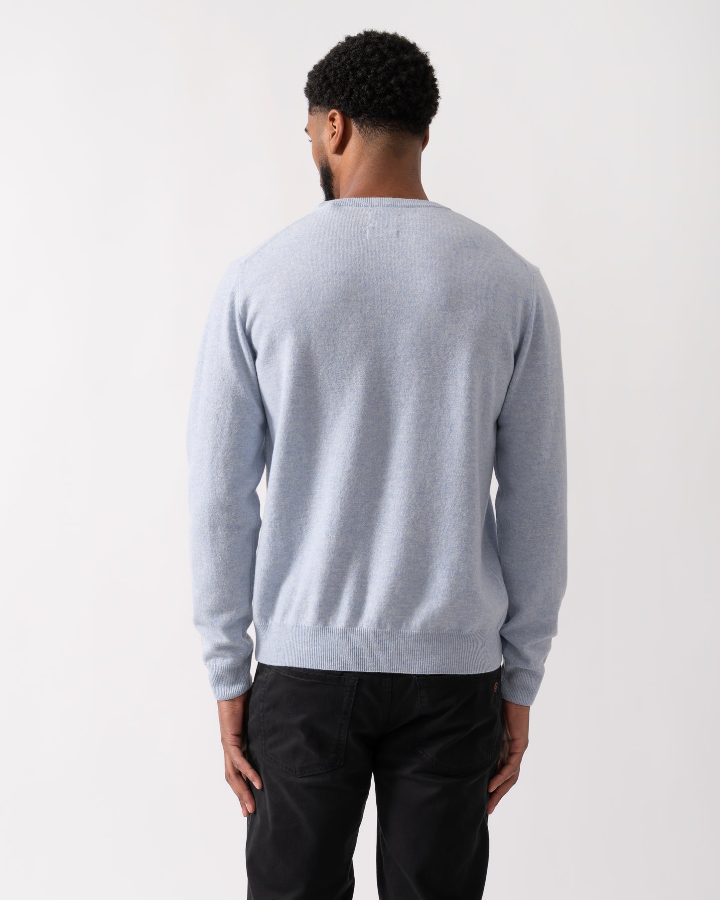 back shot of a model wearing a GANT Mens Superfine Lambswool Crew Neck Jumper in Ice Blue Melange