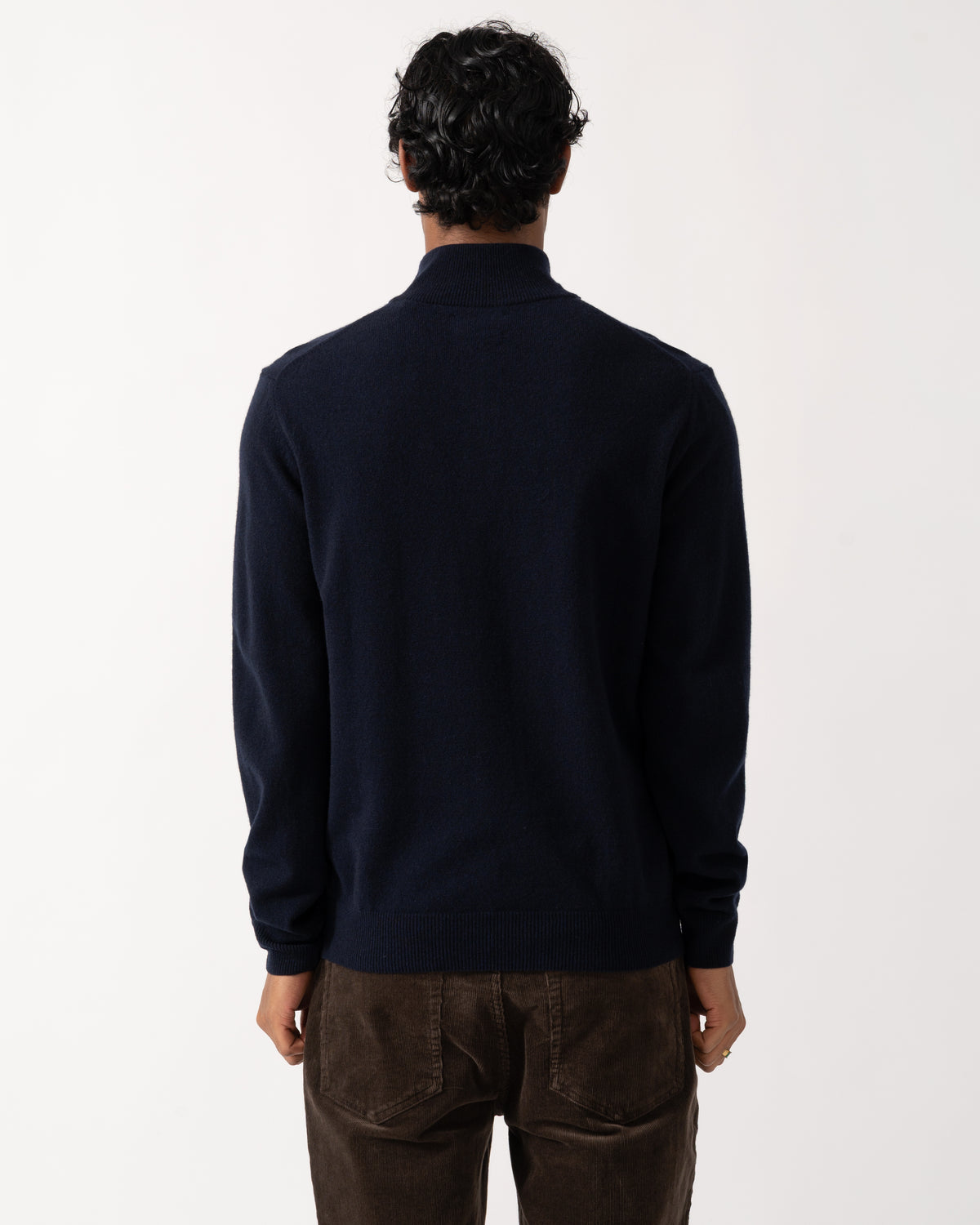 studio photograph showing the back of a model wearing a GANT Mens Superfine Lambswool Half Zip Sweater in 410 Marine