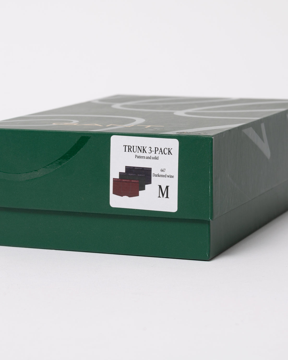 studio photograph showing the packaging detail of a GANT Mens Trunk 3-Pack Gift Box in 667 Darkened Wine