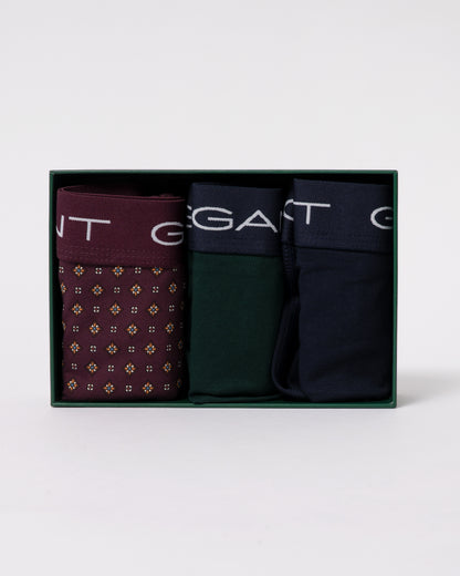 studio photograph showing the inside packaging of a GANT Mens Trunk 3-Pack Gift Box in 667 Darkened Wine