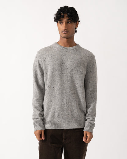 Studio photograph of a model wearing a GANT Mens Wool Blend Neps Crew Neck Sweater in 93 Grey Melange