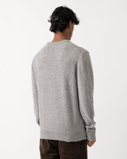 Studio photograph showing the back of a model wearing a GANT Mens Wool Blend Neps Crew Neck Sweater in 93 Grey Melange