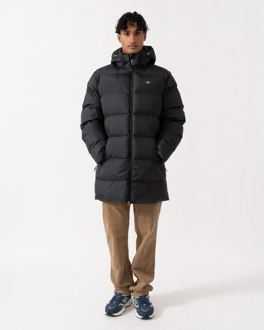 Model wearing the GANT Active Cloud Mens Mid Length Jacket - 5 Black