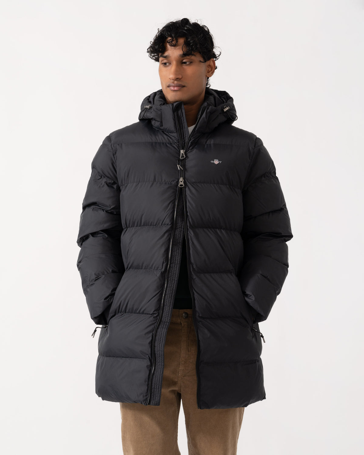 Front of the GANT Active Cloud Mens Mid Length Jacket - 5 Black showing the double zip feature