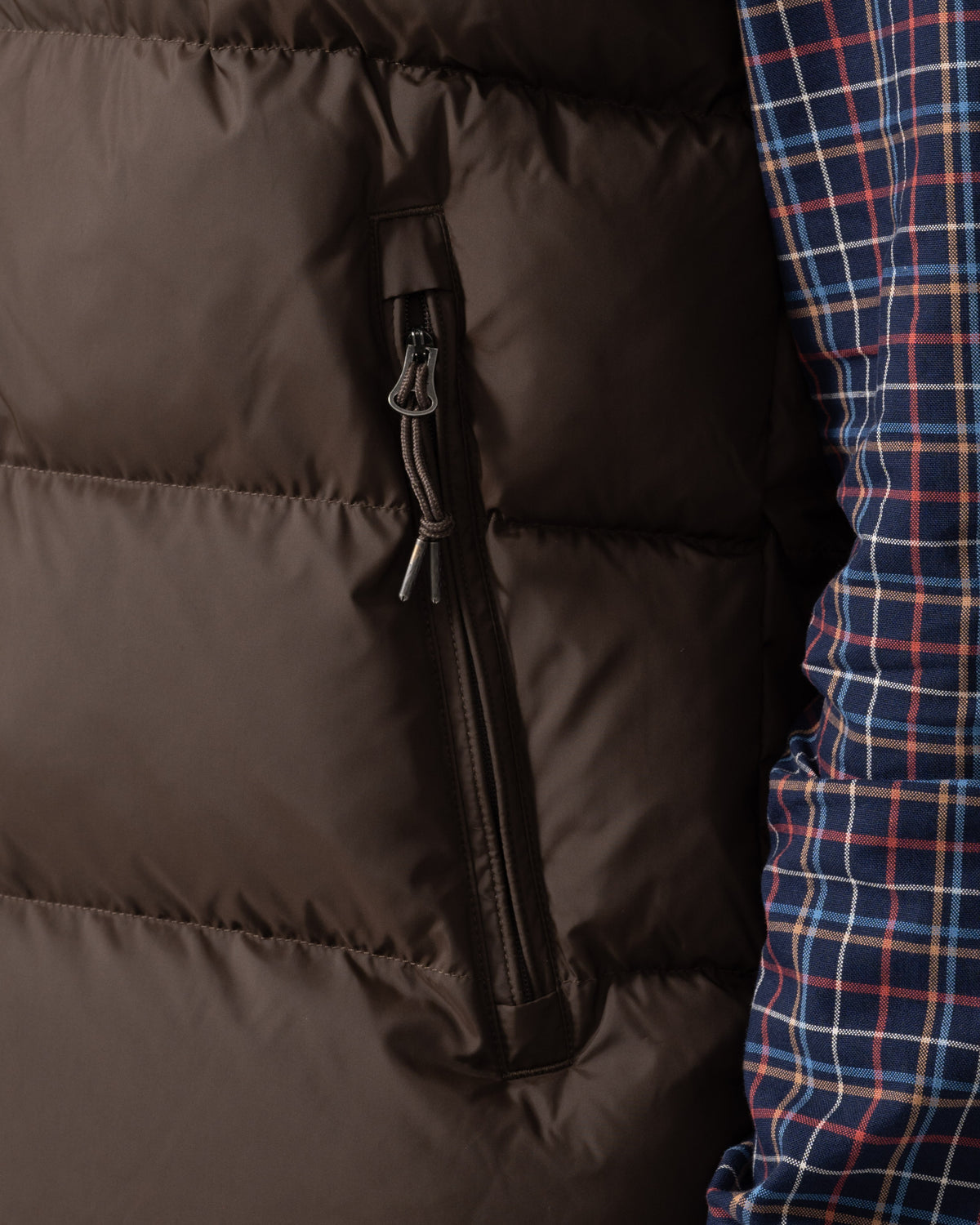 Pocket on the outside of the GANT Mens Active Cloud Vest - 217 Black Brown