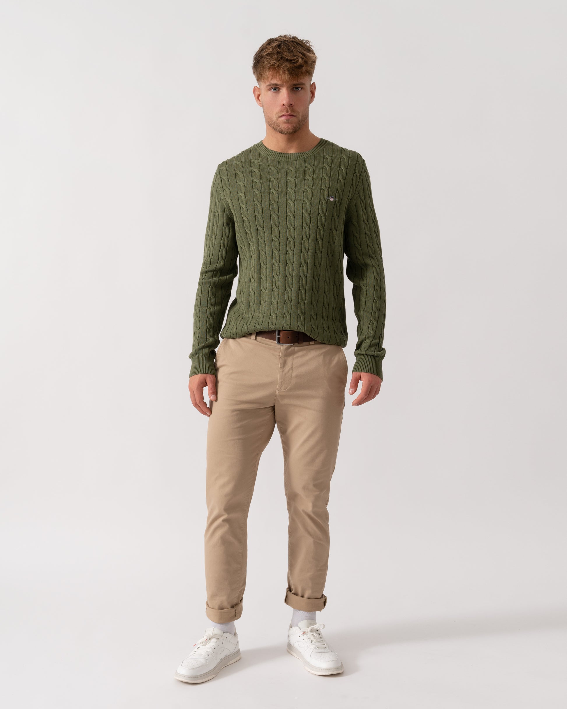 Model wearing GANT Mens Cotton Cable Knit Crew Neck Jumper in 379 Dry Herb Green - Full Length
