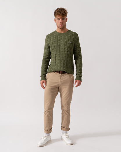 Model wearing GANT Mens Cotton Cable Knit Crew Neck Jumper in 379 Dry Herb Green - Full Length