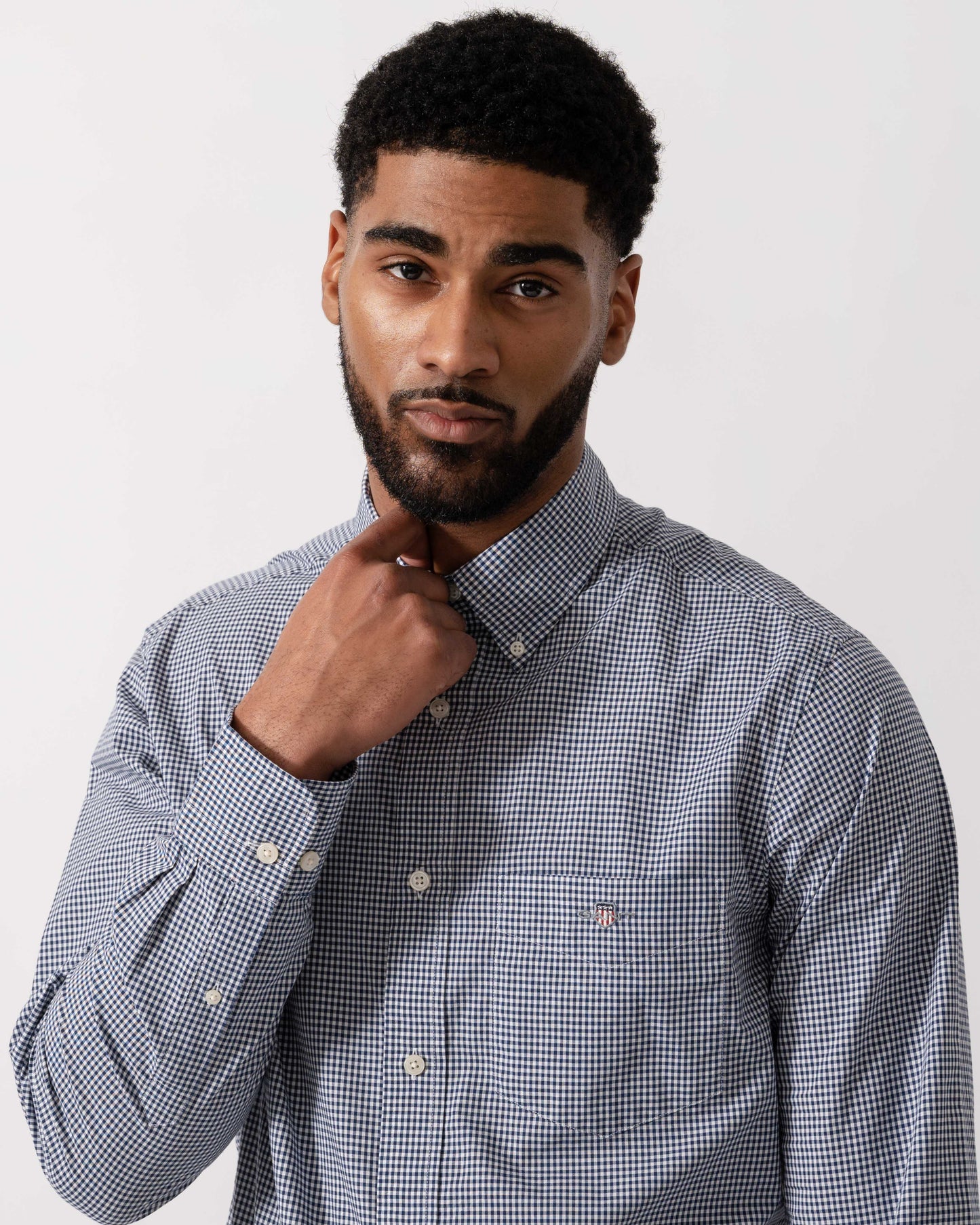 Model wearing GANT Mens Regular Fit Classic Poplin Gingham Shirt in 423 Persian Blue -  detail