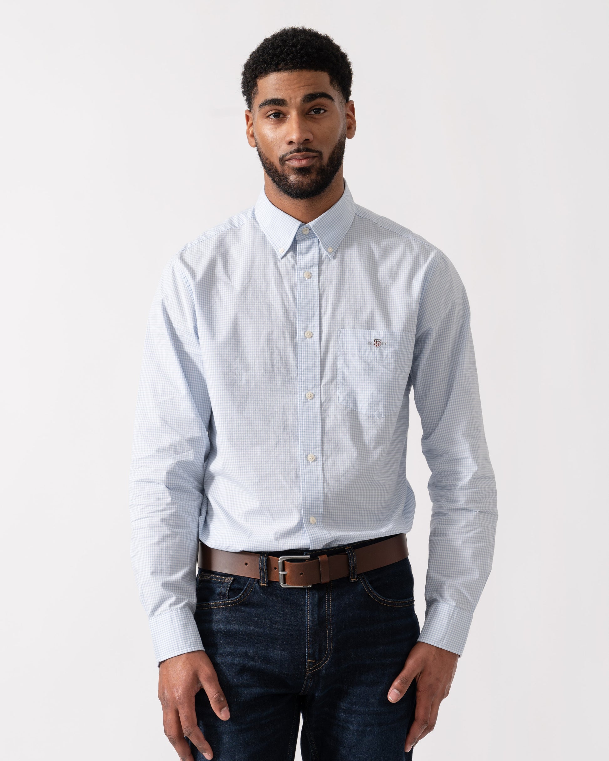 Model wearing GANT Mens Regular Fit Classic Poplin Gingham Shirt in 455 Light Blue - Main