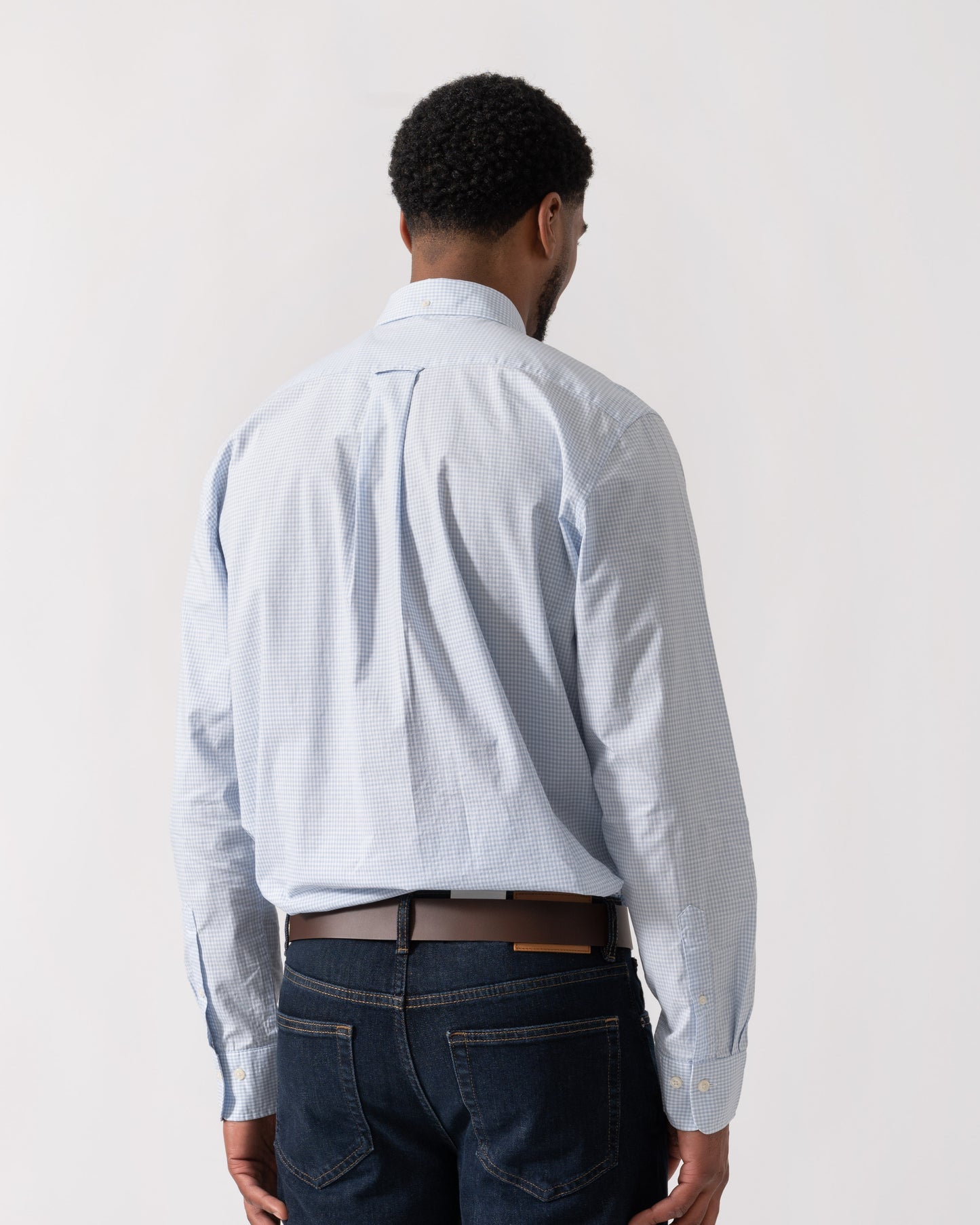 Model wearing GANT Mens Regular Fit Classic Poplin Gingham Shirt in 455 Light Blue - back