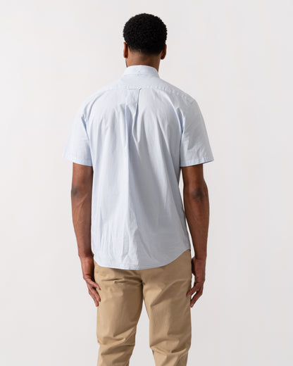 Model wearing a GANT Mens Regular Fit Classic Poplin Gingham Short Sleeve Shirt in 455 Light Blue - back