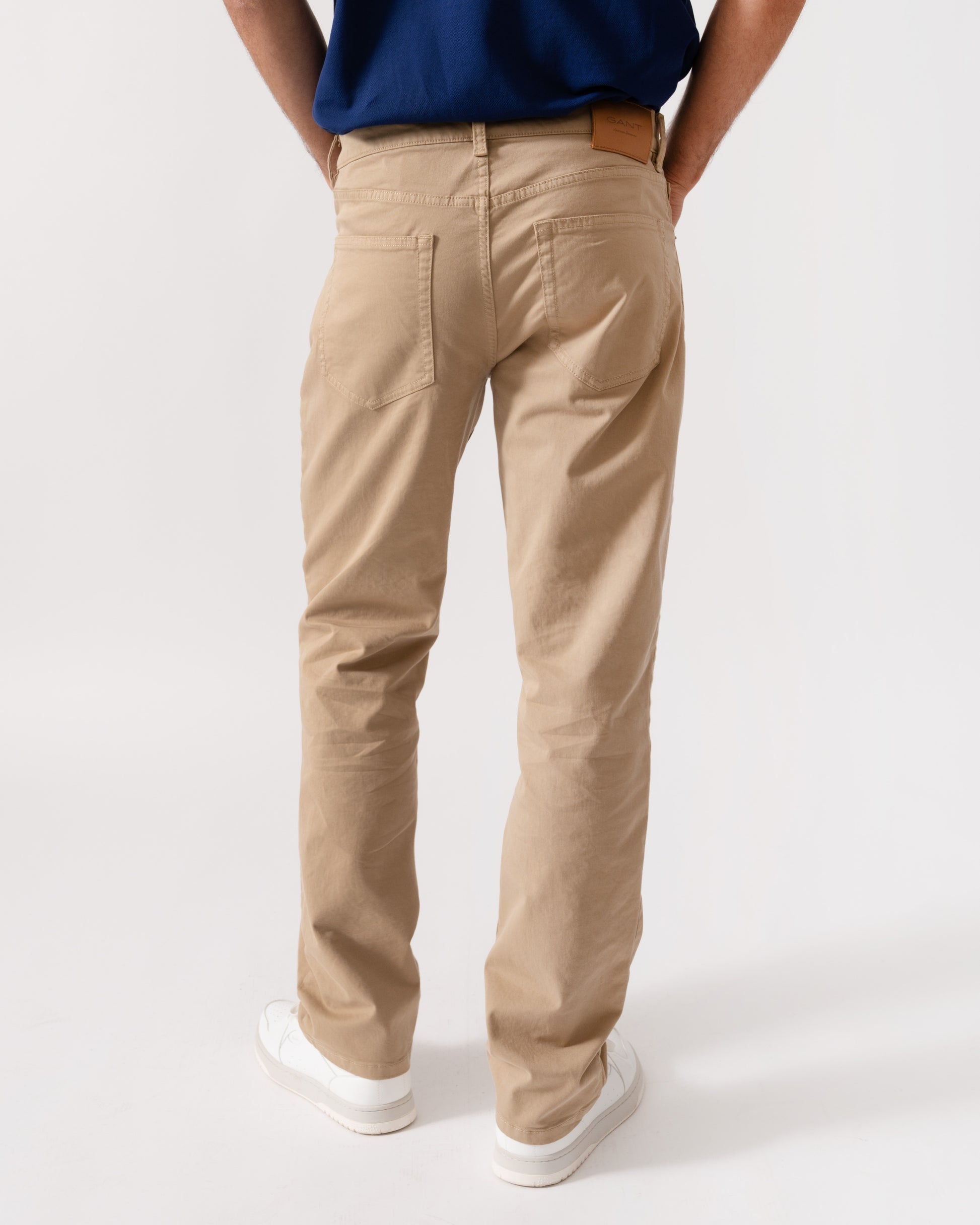 model wearing GANT Mens Regular Fit Desert Jeans - 248 Dark Khaki back