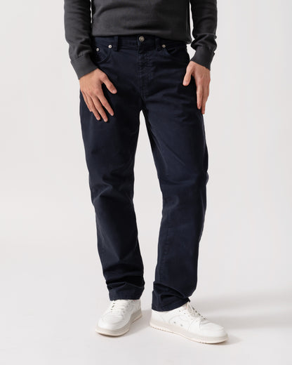 Model is wearing GANT Mens Regular Fit Desert Jeans in 433 Evening Blue - Front