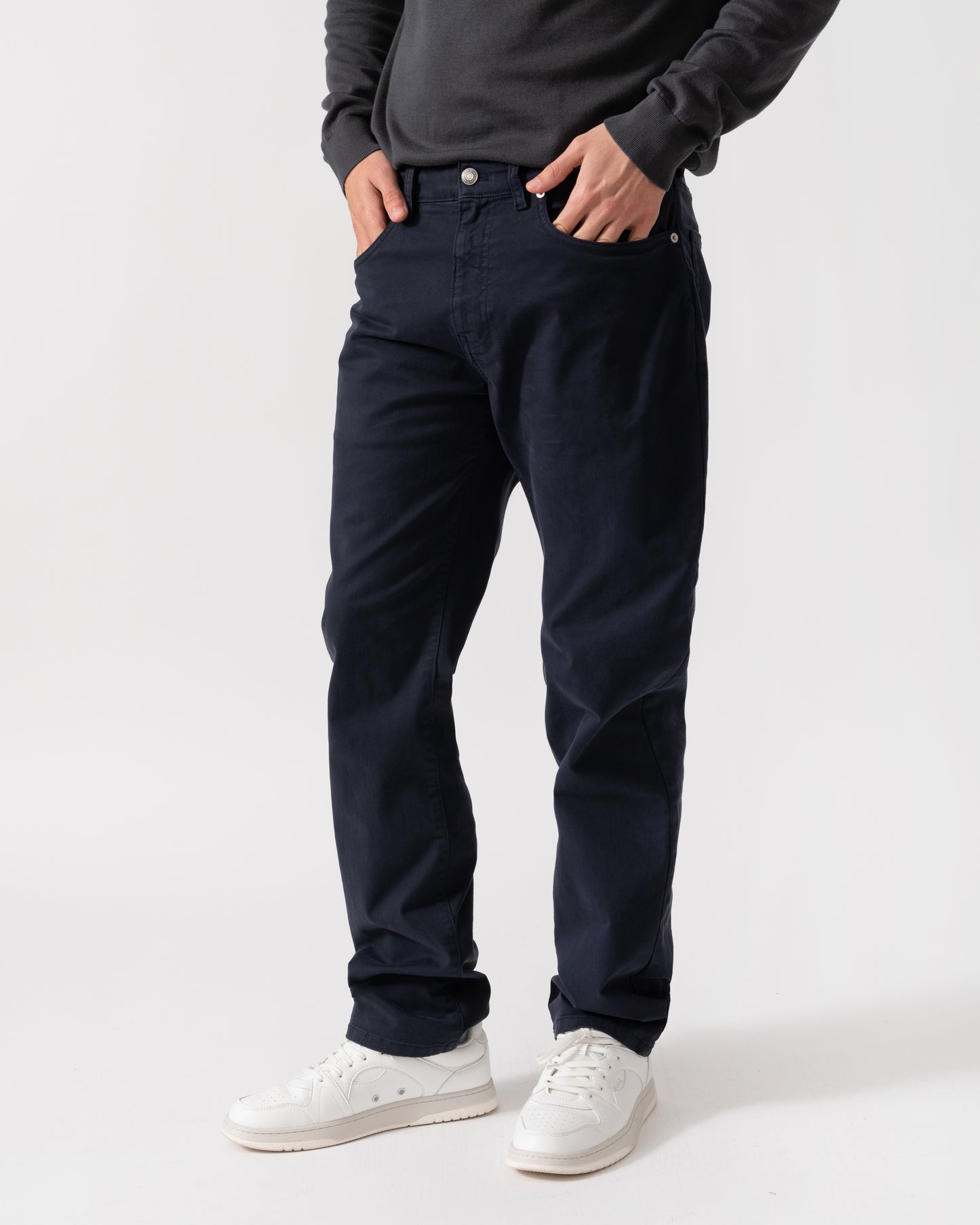 Model is wearing GANT Mens Regular Fit Desert Jeans in 433 Evening Blue - Pockets