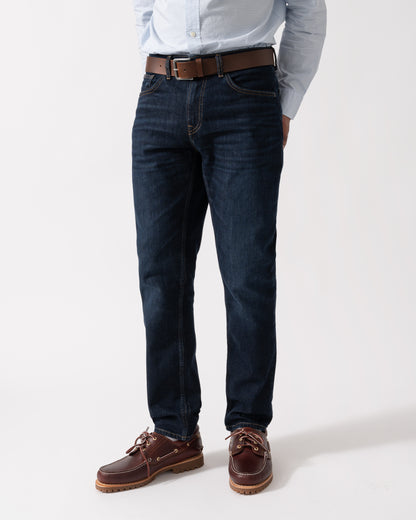 Model wearing GANT Mens Regular Fit Gant Jeans in 962 Dark Blue Broken In - Main