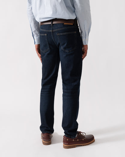 Model wearing GANT Mens Regular Fit Gant Jeans in 962 Dark Blue Broken In - back