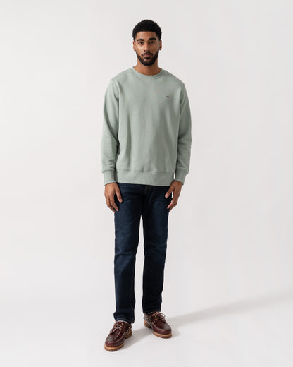Model wearing GANT Mens Regular Fit Shield Logo Crew Neck Sweatshirt -in 10 Ceramic Grey -  full length