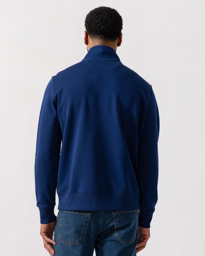 Model wearing GANT Mens Regular Fit Shield Logo Half Zip Sweatshirt in 432 Rich Navy - Back