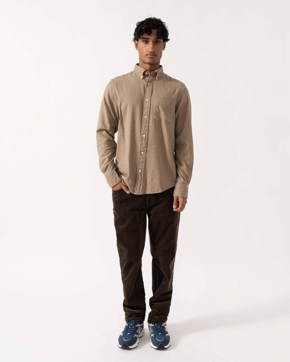 Man wearing the GANT Mens Regular Fit Cord Jeans - 217 Black Brown