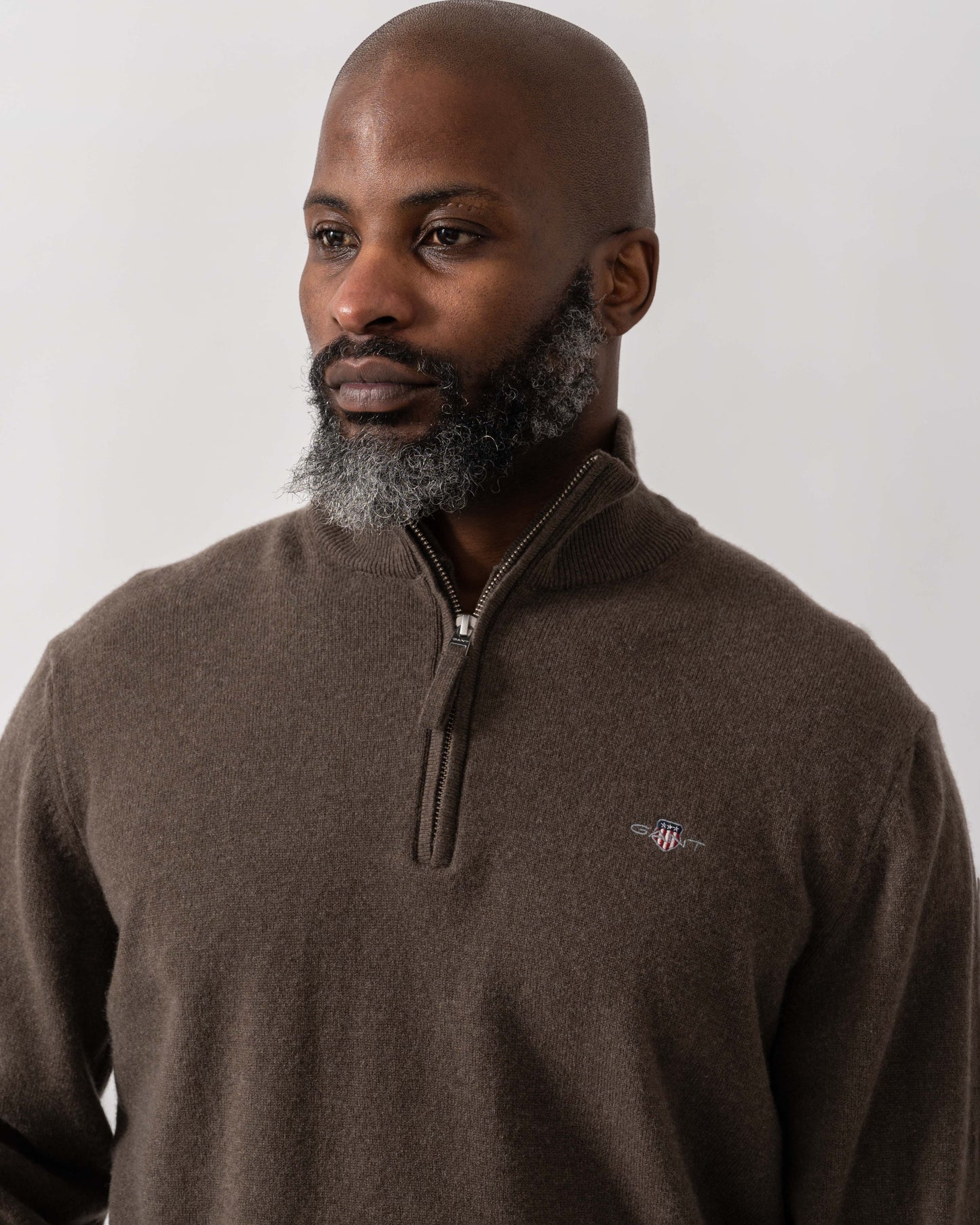 Model wearing GANT Mens Superfine Lambswool Half Zip Cardigan in 290 Seawood Melange - Detail