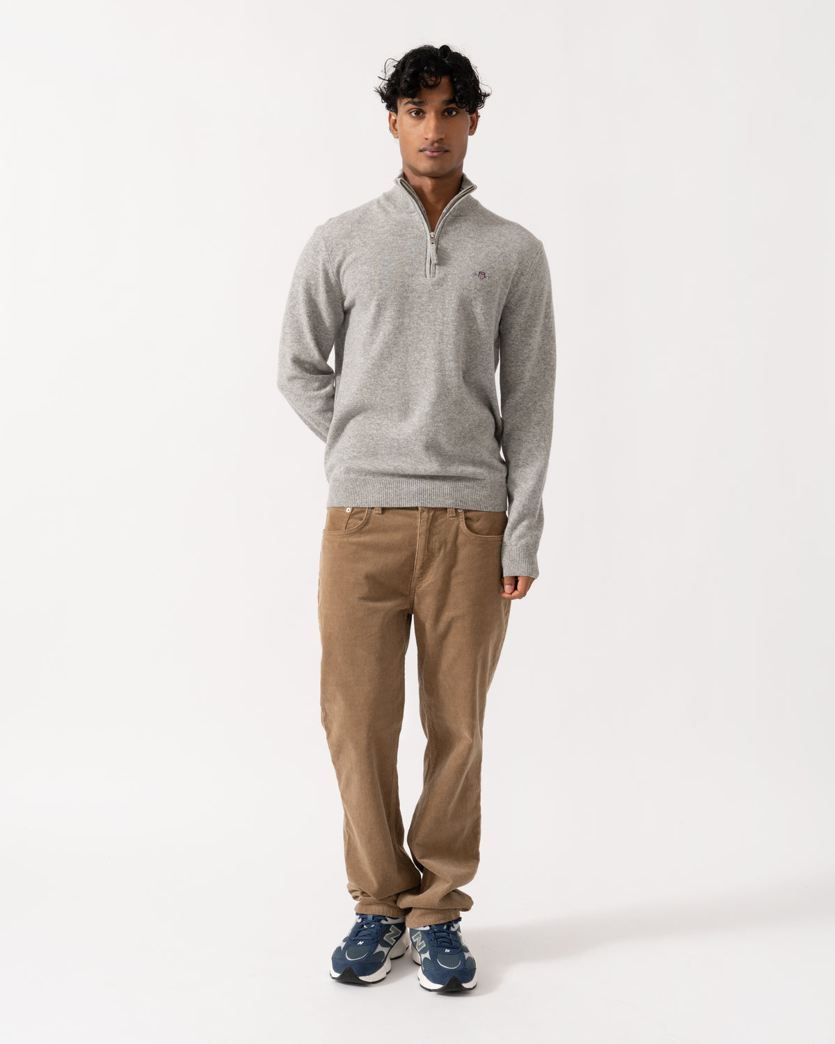 Man wearing the GANT Mens Superfine Lambswool Half Zip Sweater - 93 Grey Melange