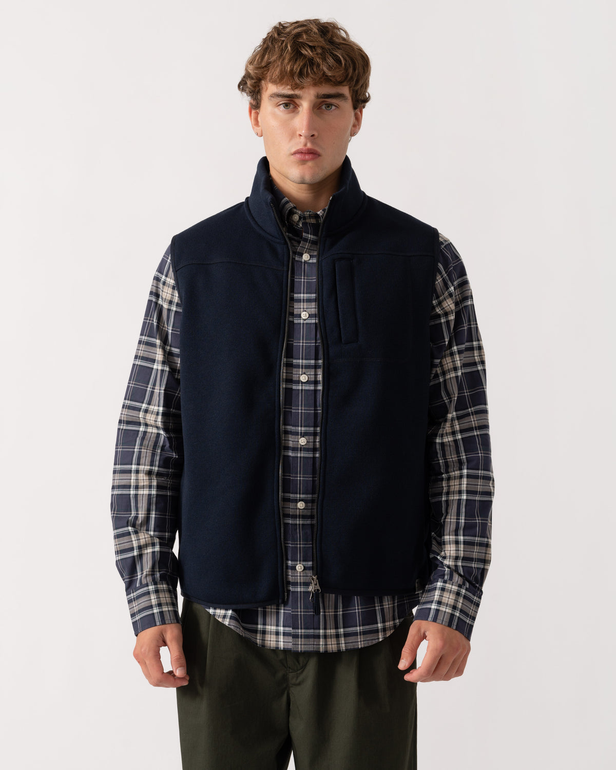 Man wearing GANT Mens Zipped Fleece Vest - 433 Evening Blue