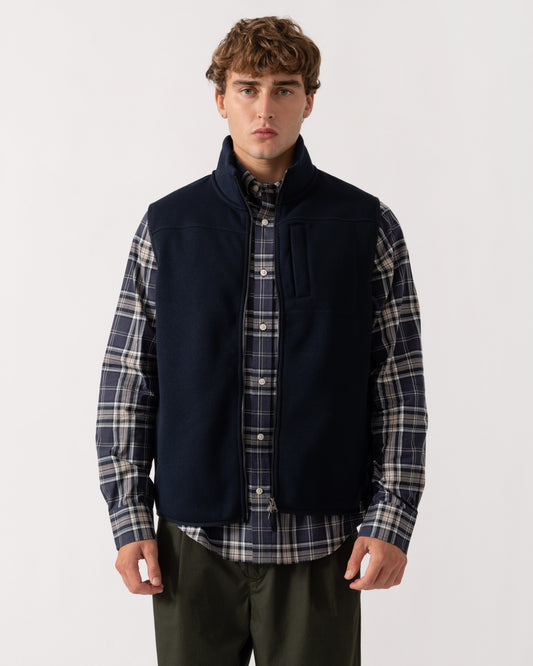 Man wearing GANT Mens Zipped Fleece Vest - 433 Evening Blue