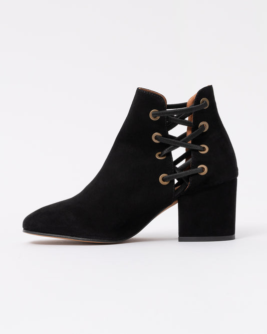 Black suede ankle boot with block heel on a white background