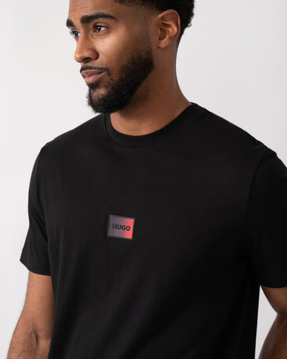 detail shot of a model wearing a HUGO Danotie Mens Red Label Logo T-Shirt in Black