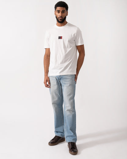 full length of a model wearing a HUGO Danotie Mens Red Label Logo T-Shirt in natural white