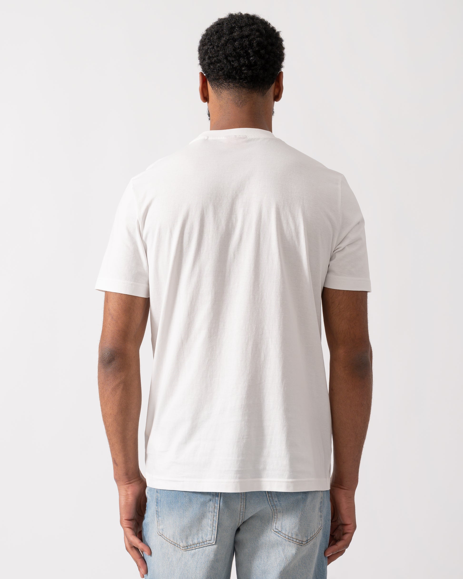 back of a model wearing a HUGO Danotie Mens Red Label Logo T-Shirt in natural white