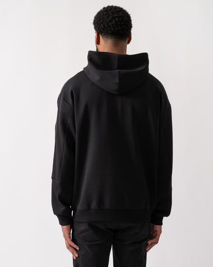 back shot of a model wearing a HUGO Danovohood Mens Hoodie in Black