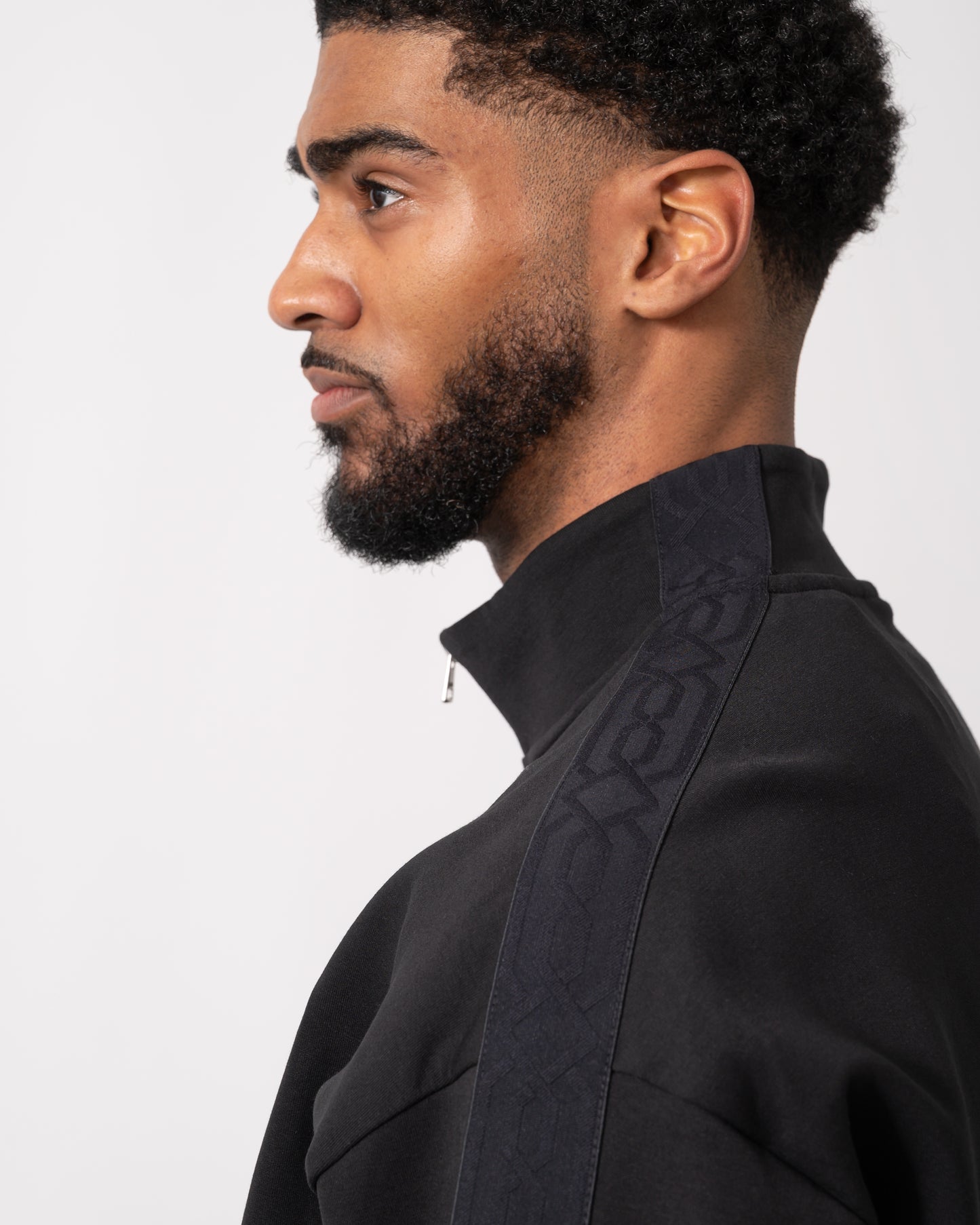 shoulder detail shot of a model wearing a HUGO Danovotop Mens Sweatshirt in Black