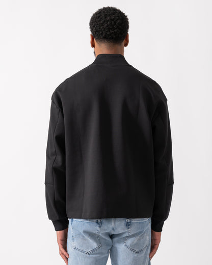 back shot of a model wearing a HUGO Danovotop Mens Sweatshirt in Black