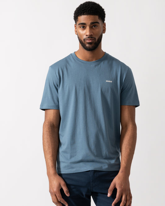 Model wearing a HUGO Dero222 Mens Cotton-Jersey T-Shirt with Logo Print in Open Blue