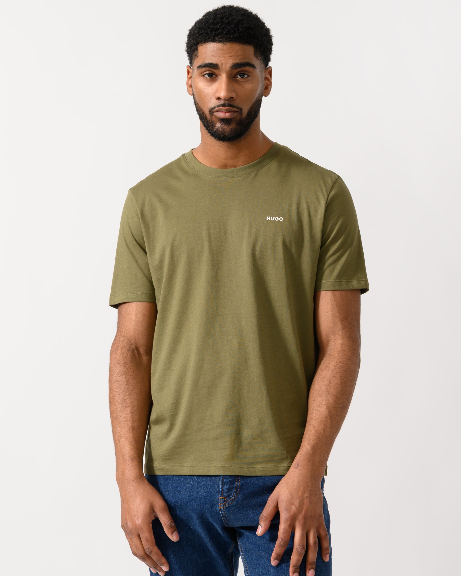 model wearing a HUGO Dero222 Mens Cotton-Jersey T-Shirt with Logo Print in Open Green