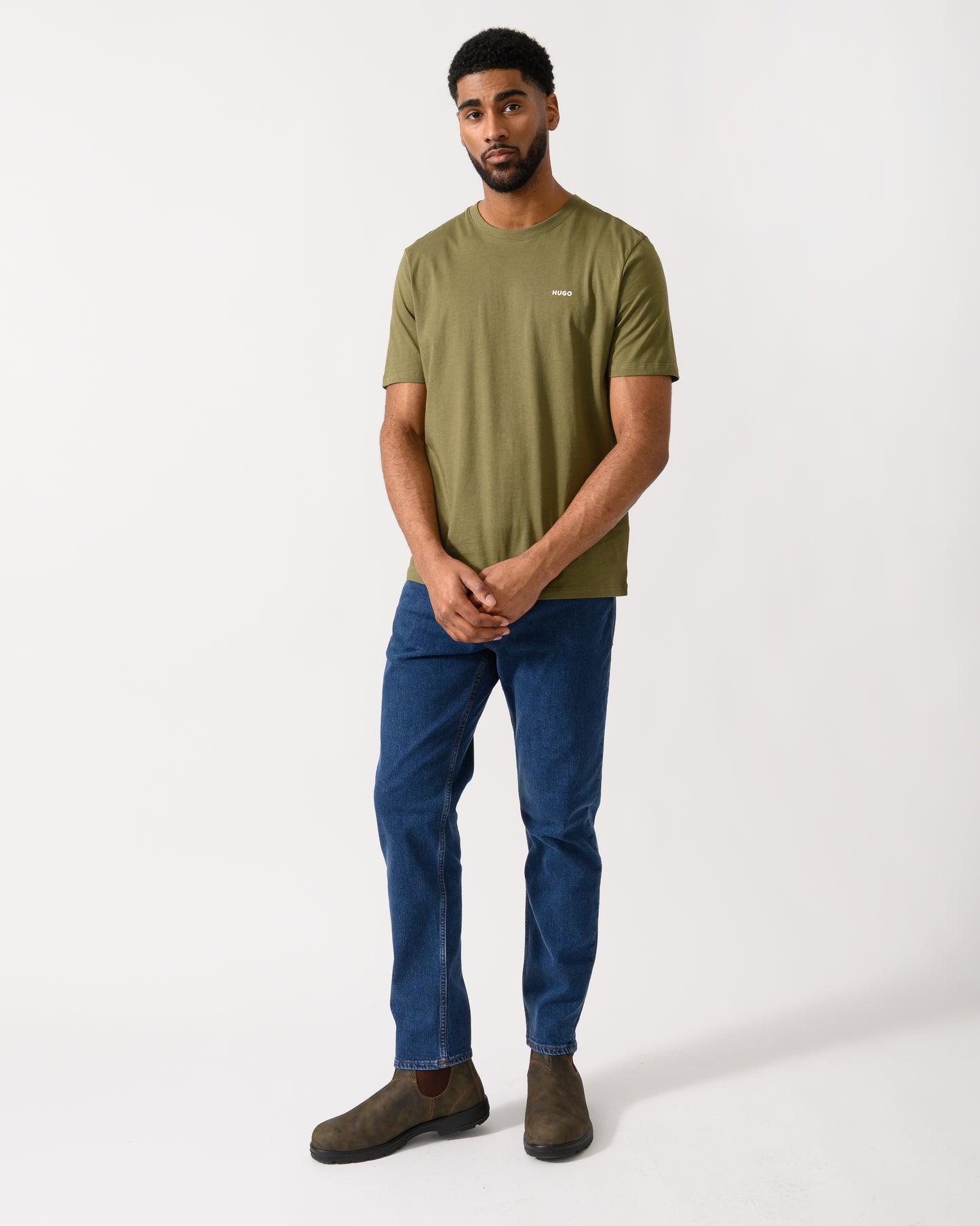 full length shot of a model wearing a HUGO Dero222 Mens Cotton-Jersey T-Shirt with Logo Print in Open Green