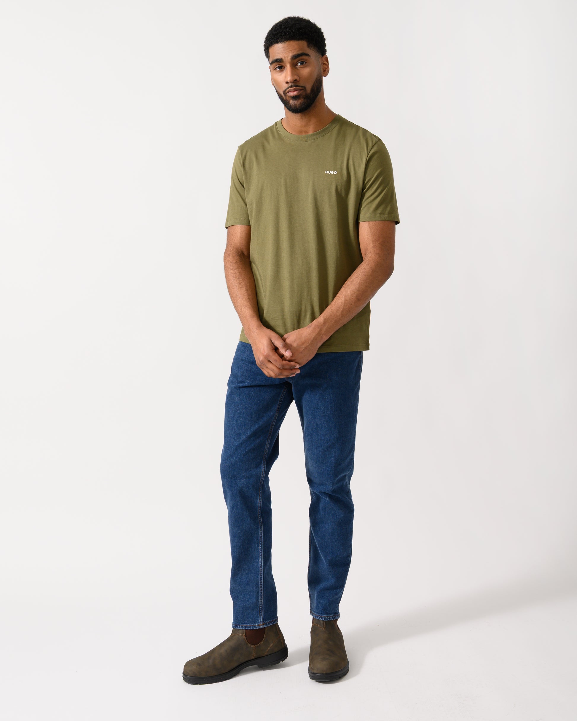 full length shot of a model wearing a HUGO Dero222 Mens Cotton-Jersey T-Shirt with Logo Print in Open Green