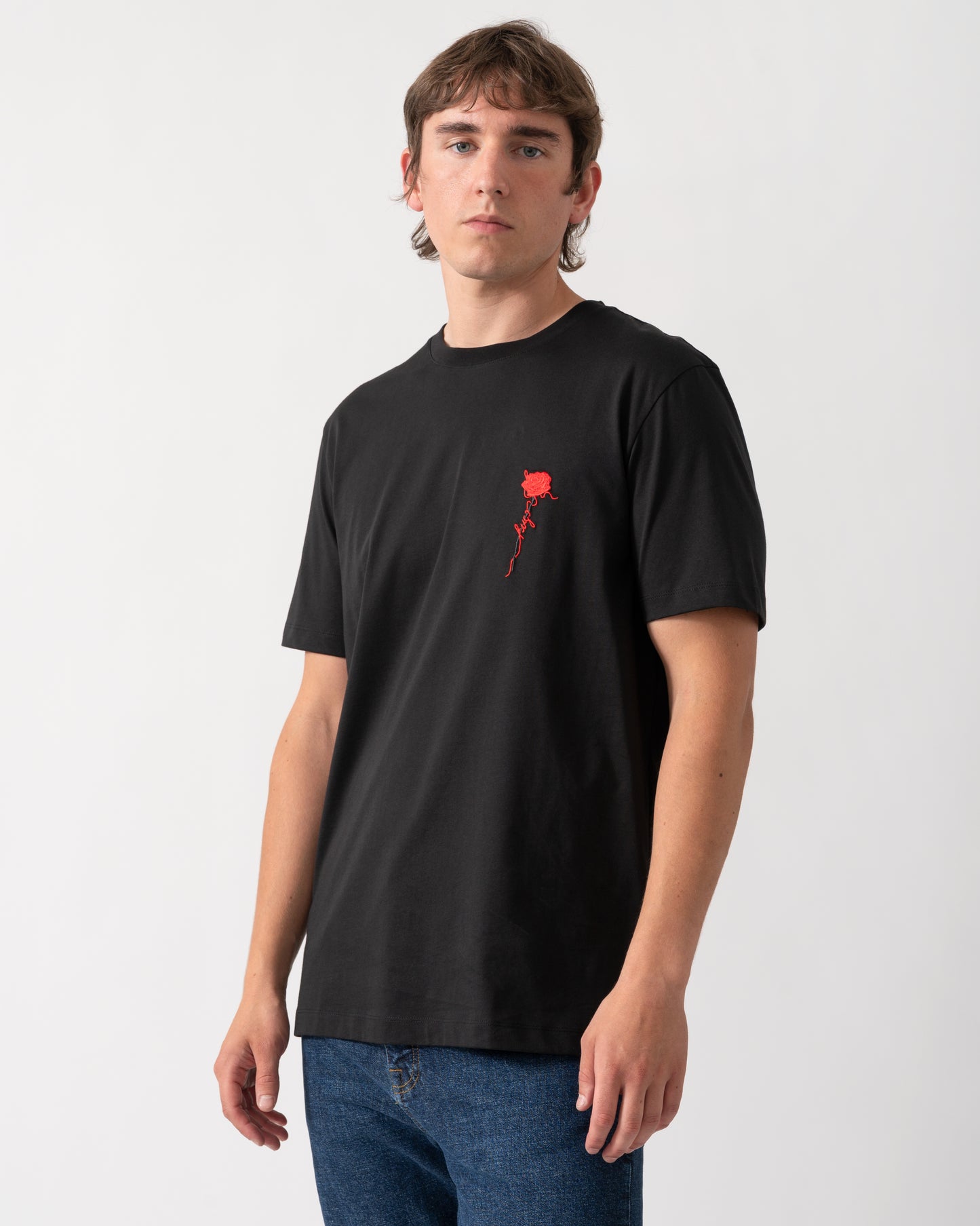 model wearing a HUGO Diflow Mens T-Shirt in Black 001