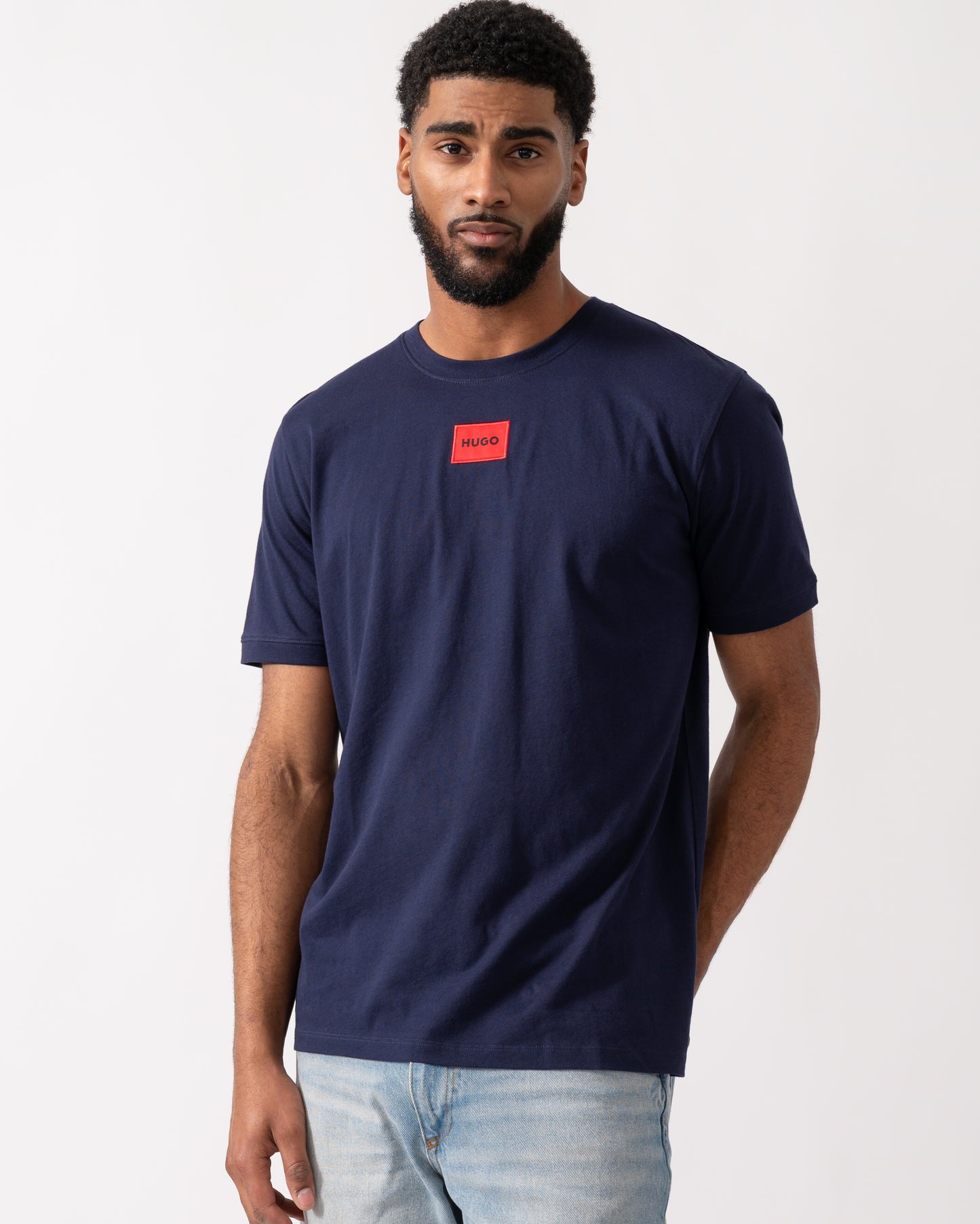 model wearing a HUGO Diragolino212 Label Logo Mens T-Shirt in Navy