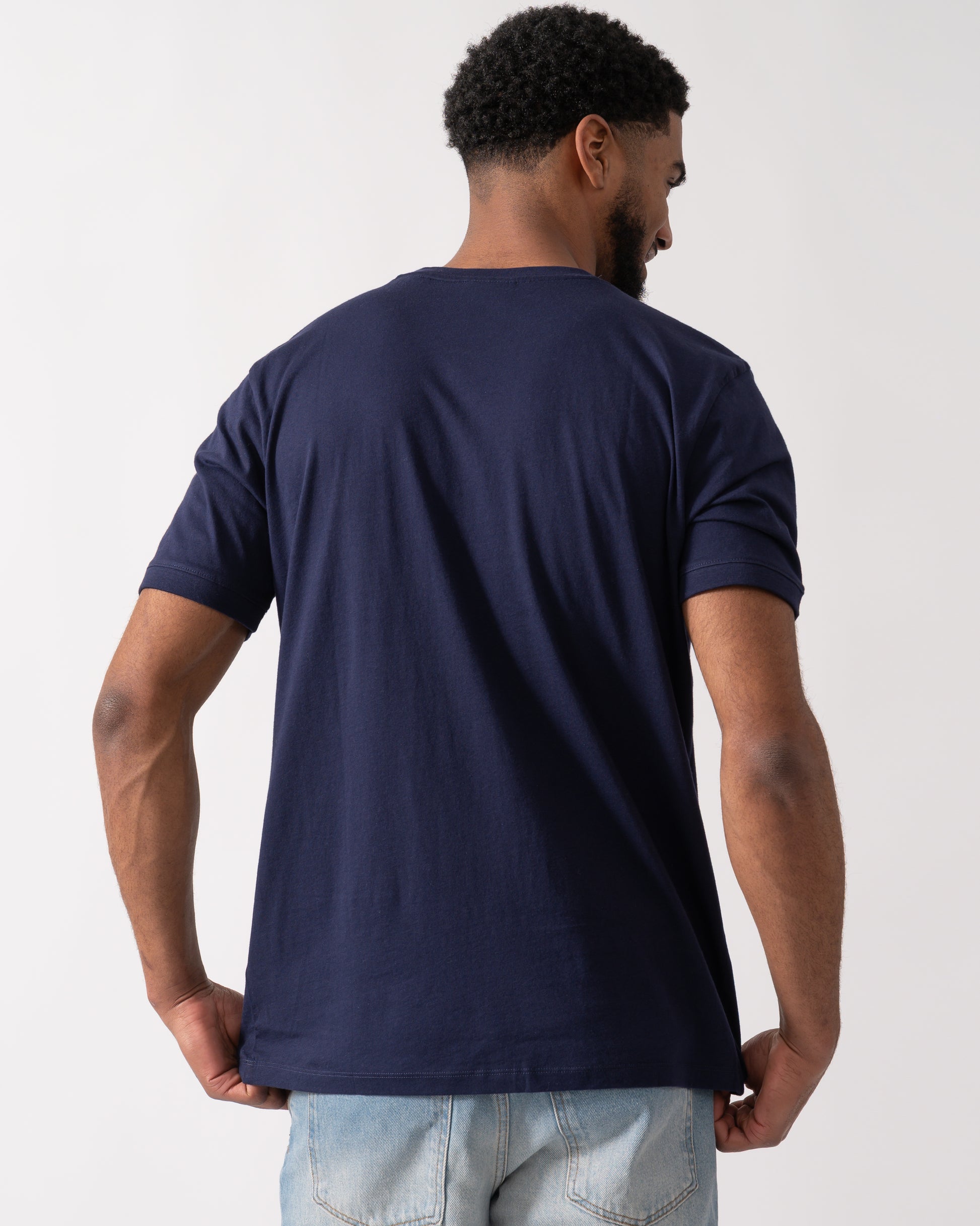 back of a model wearing a HUGO Diragolino212 Label Logo Mens T-Shirt in Navy