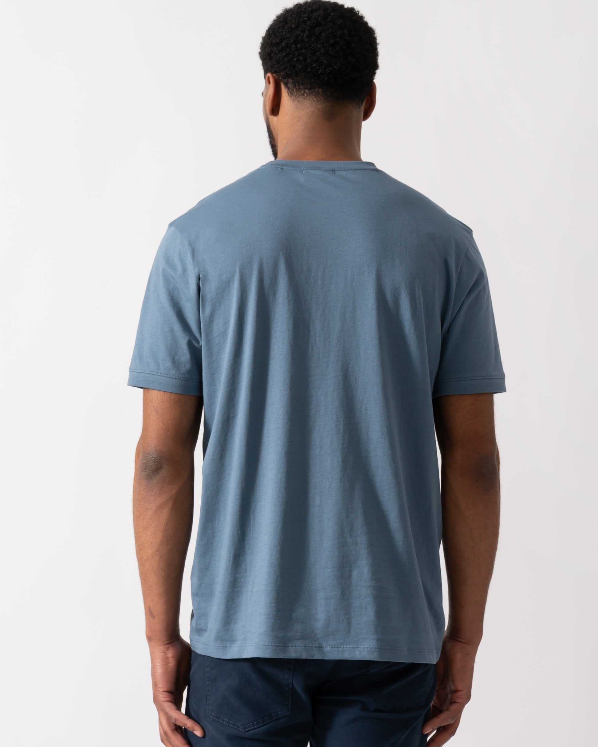 Back shot of a Model wearing a HUGO Diragolino212 Label Logo Mens T-Shirt in Open Blue