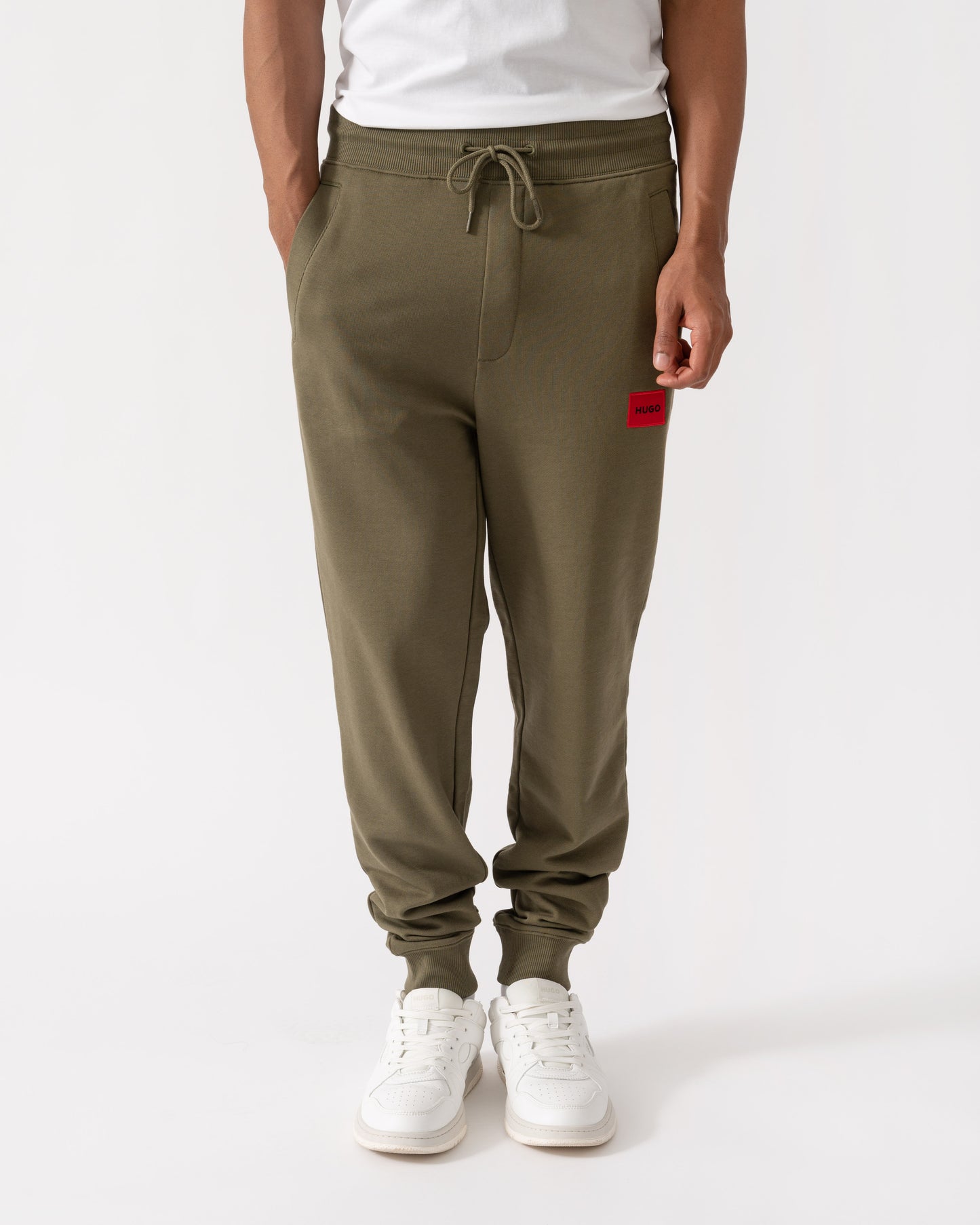Front shot of HUGO Doak212 Mens Joggers - Open Green 389