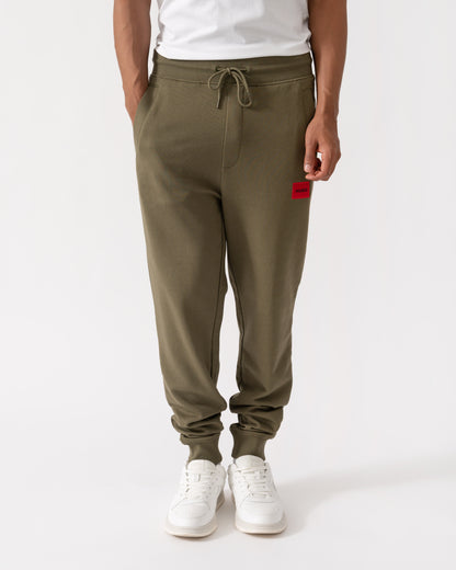 Front shot of HUGO Doak212 Mens Joggers - Open Green 389