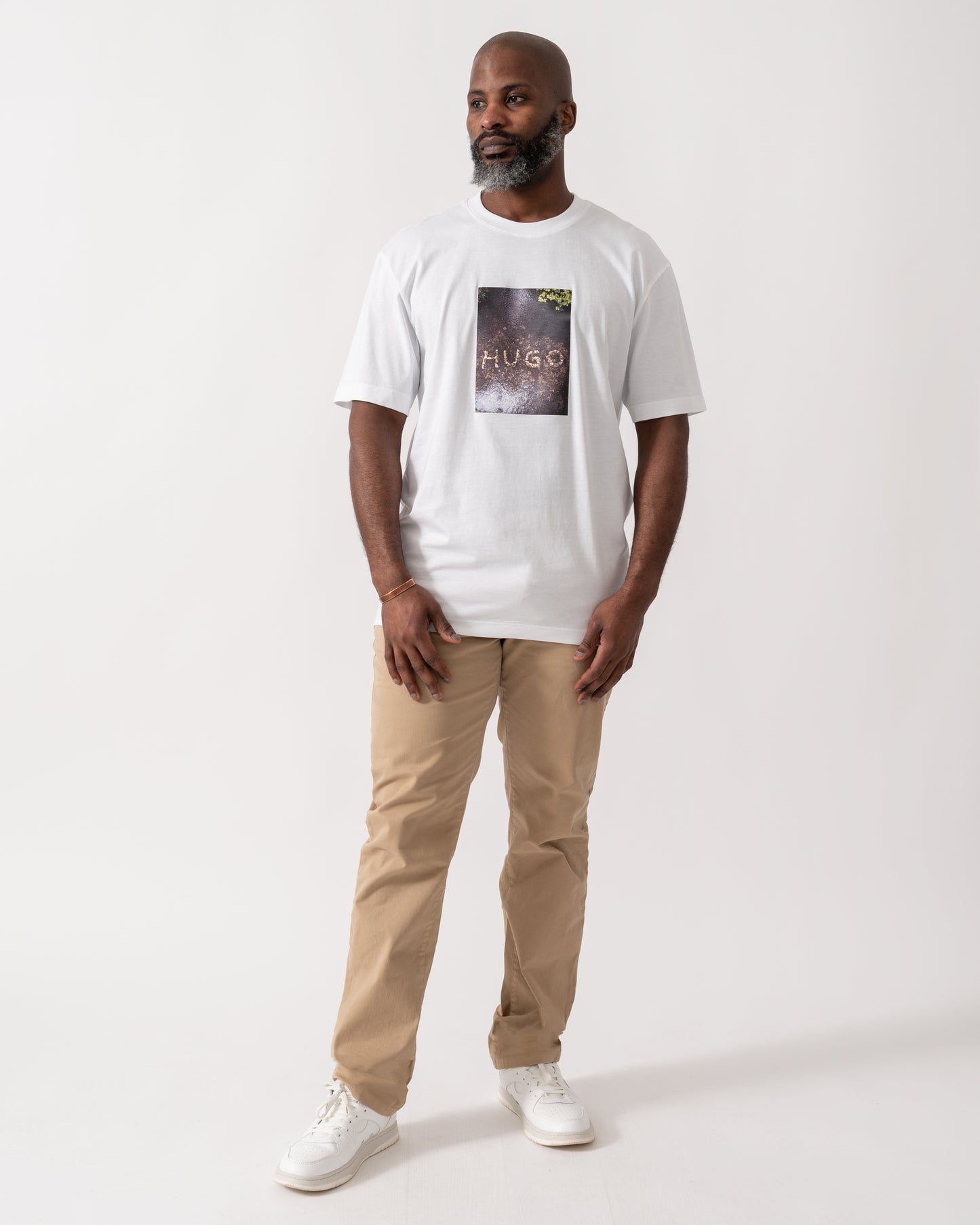 full length shot of a model wearing a HUGO Doreston Mens Graphic T-Shirt in White