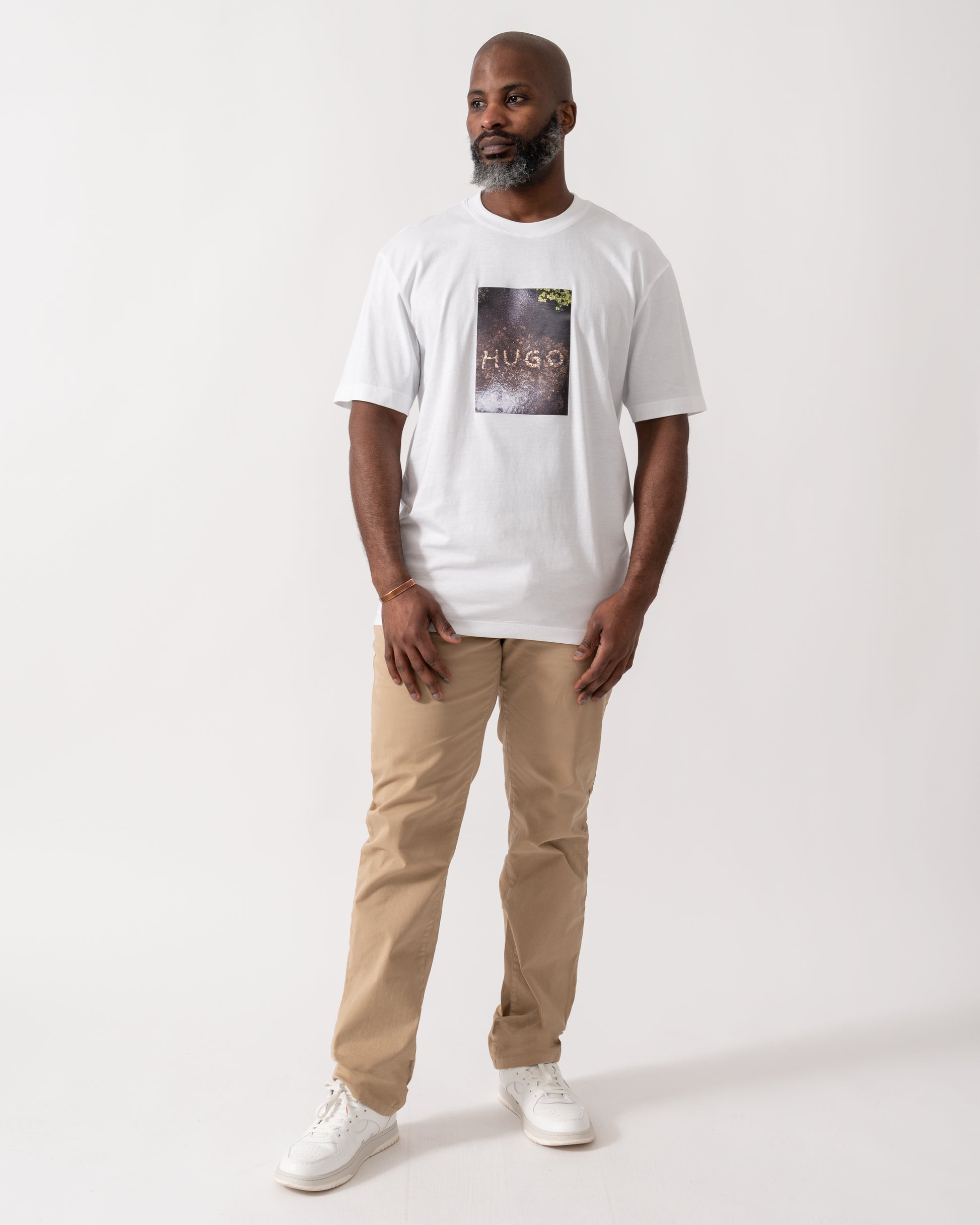 full length shot of a model wearing a HUGO Doreston Mens Graphic T-Shirt in White
