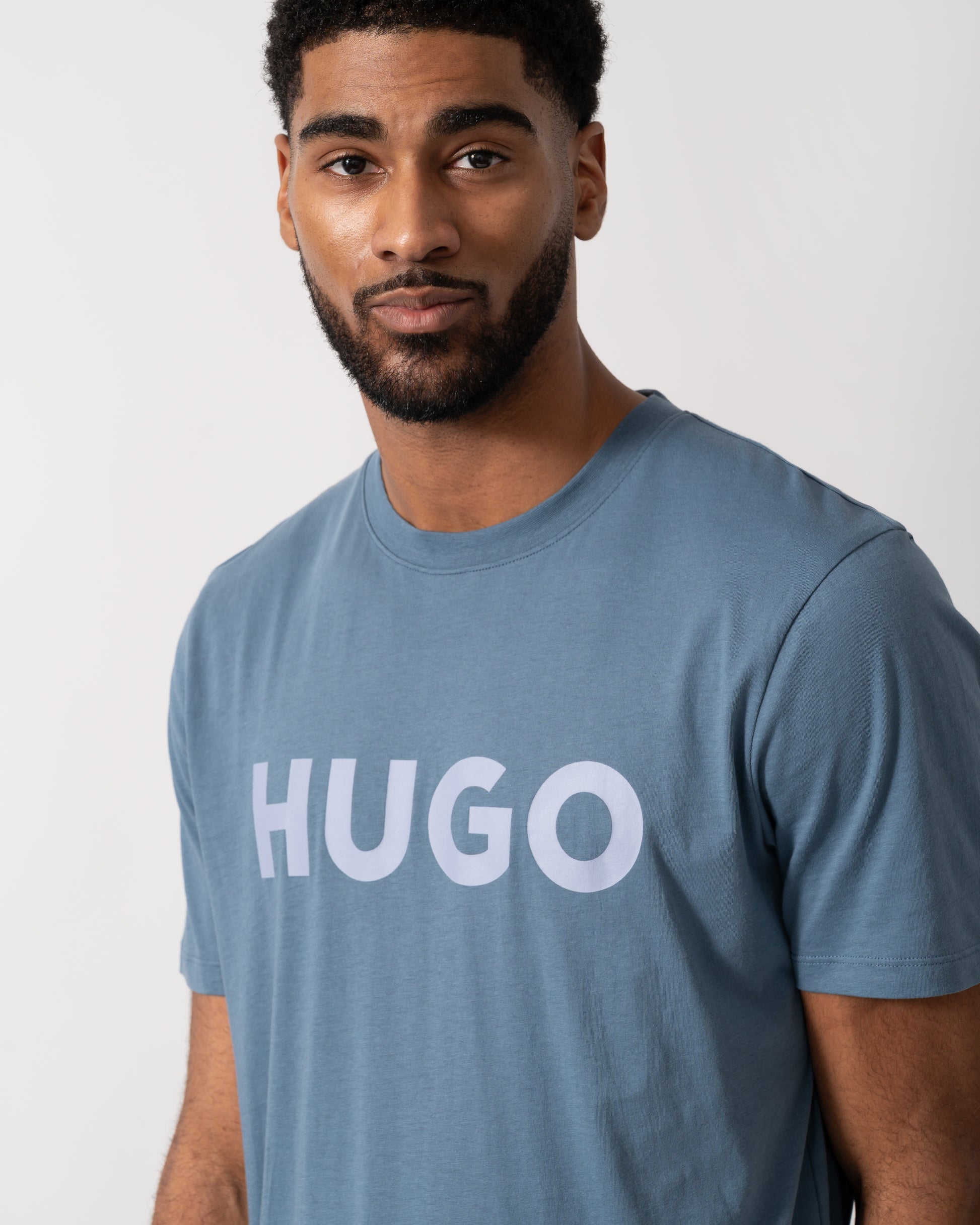 Detail shot of a Model wearing a HUGO Dulivio Mens T-Shirt in Open Blue