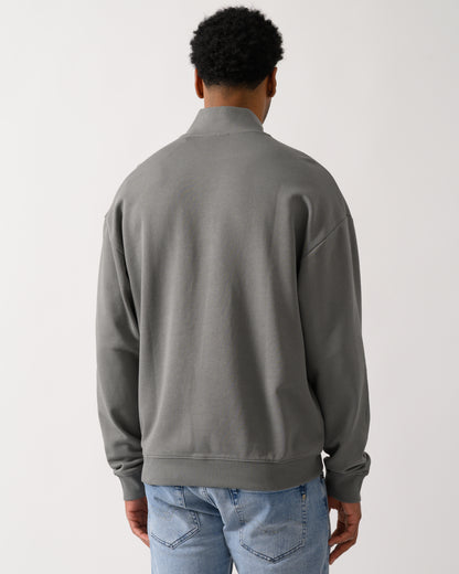 back shot of a model wearing a HUGO Durty244 Mens 1/4 Zip Sweatshirt in Dark Grey 025