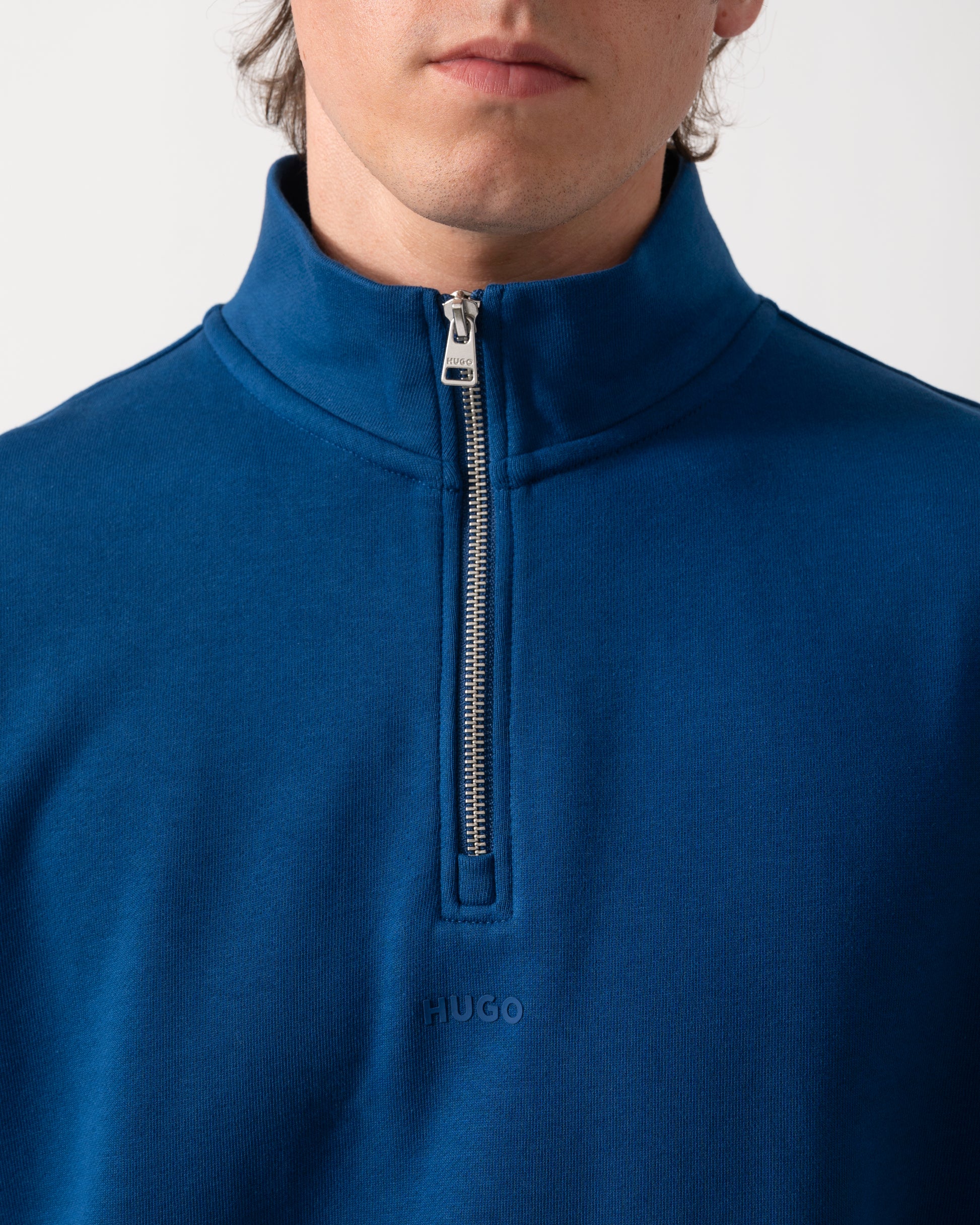 detail of a HUGO Durty244 Mens 1/4 Zip Sweatshirt in Open Blue 498